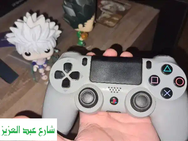 احتفِ بالذكرى العشرين! تحكم بلعبة بلاي ستيشن 4 مع يد تحكم DualShock® الإصدار المحدود
