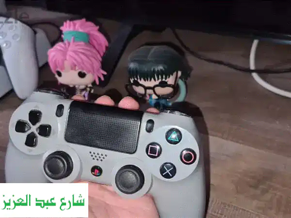 احتفِ بالذكرى العشرين! تحكم بلعبة بلاي ستيشن 4 مع...