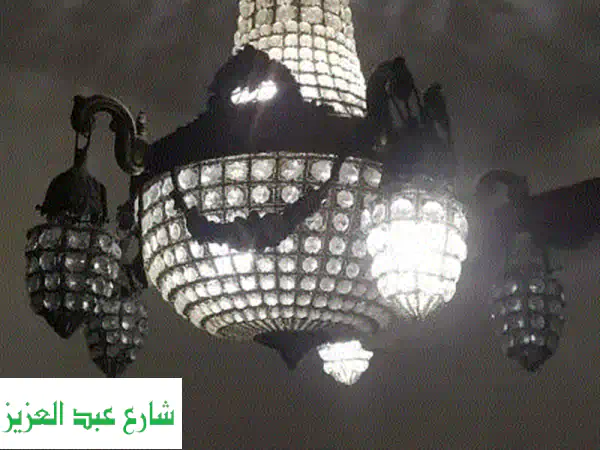 نجفة نحاس غزالة فاخرّة: تضفي سحراً شرقياً على منزلك!