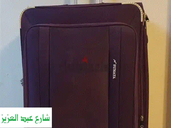 حقيبة سفر فاخرة بسعر لا يقاوم! (مع عيب بسيط في اليد)