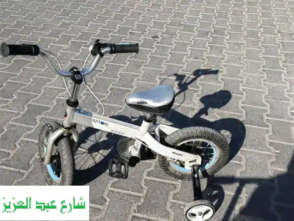 دراجة أطفال ثلاث عجلات - حالة ممتازة!  سعادة طفلك في انتظارك!