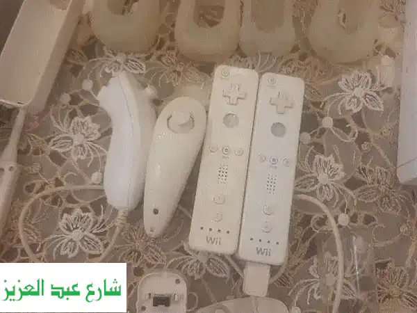 Wii كامل مع ألعاب وملحقاته - تجربة لعب لا تُنسى!