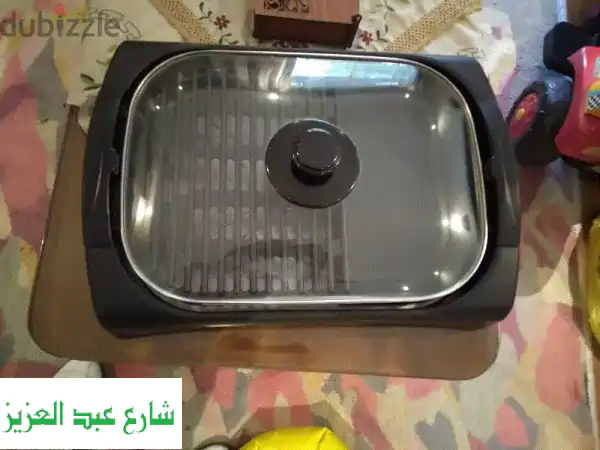 شواية كهربائية Black & Decker (2000 وات) + مصفاة خضار ايكيا...